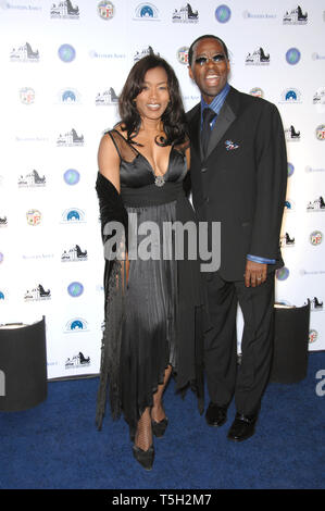 LOS ANGELES, CA. October 29, 2006: ANGELA BASSETT & husband COURTNEY B. VANCE at the reopening gala for the historic Griffith Observatory in Los Angeles. Picture: Paul Smith / Featureflash Stock Photo