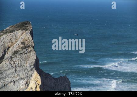 Beautiful Ursa beach with its colossal rock formations and the blue Atlantic Ocean Stock Photo