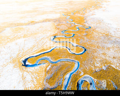 Winding River in Yellow Field, Colorado Stock Photo