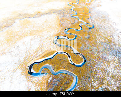 Winding River in Yellow Field, Colorado Stock Photo