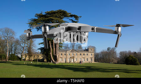 Drone flys by Lydiard House at Lydiard Park  Swindon, Wiltshire, UK Stock Photo