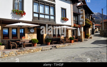 La Madrid restaurant and hotel in the scenic mountain village of Cahecho in Cantabria which has stunning views of surrounding mountains. Stock Photo