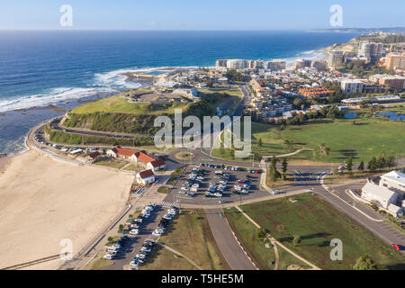 Aerial view of Newcastle featuring Nobbys Beach and Fort Scratchley - Newcastle Beach in background. Newcastle is a major city in NSW Australia. Stock Photo