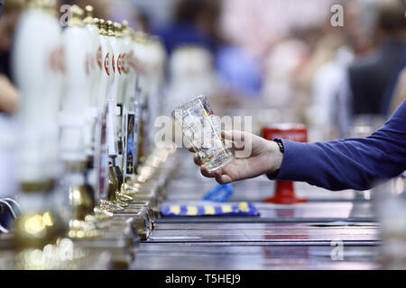 Buying a pint at The Great British Beer Festival, Earls Court, London. 5.8.10 Stock Photo