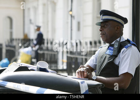 Police Community Support Officers guarding a crime scene in London. 25.08.2010. Stock Photo