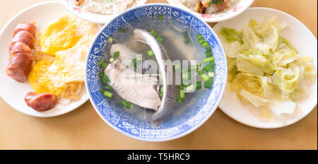 Milkfish skin soup, distinctive Taiwan delicacy food in Tainan. Famous meal set for lunch or breakfast with vegetable, top view, copy space, close up Stock Photo