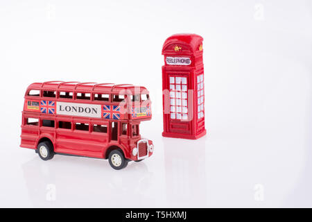 London Bus near a Telephone booth on a white background Stock Photo