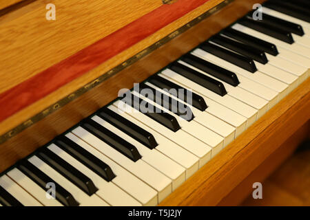 Black and white keys on the old piano. Stock Photo