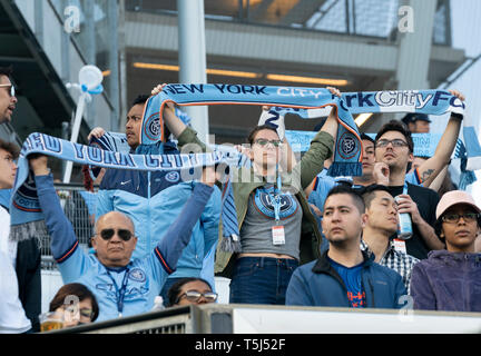 New York, NY - April 24, 2019: Fans of NYCFC attend MLS regular game against Chicago Fire at Yankee stadium NYCFC won 1-0 Stock Photo