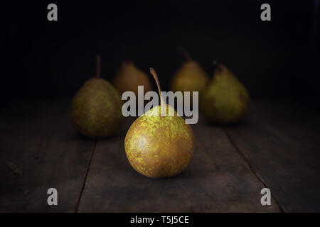 Pears on a rustic table Stock Photo