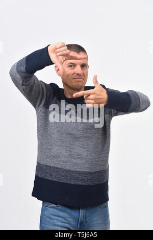 man making the gesture of frame Stock Photo