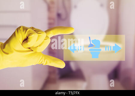 Transparent screen held by person with yellow sanitary gloves showing how to unclog toilet on drawing as modern housekeeping technology concept Stock Photo