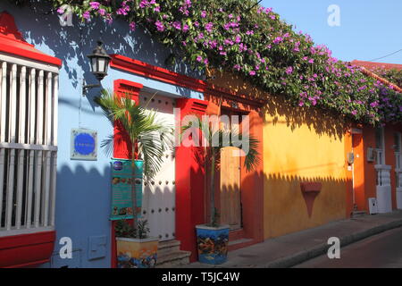 Colourful single storey painted houses in Spanish colonial style architecture in the Historic centre of Cartagena in Colombia Stock Photo