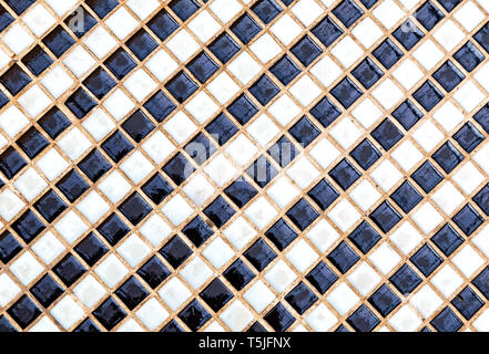 Black and white ceramic colorful tiles mosaic composition pattern background. Abstract colorful mosaic texture Stock Photo
