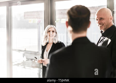 Business people having a meeting in their offce Stock Photo