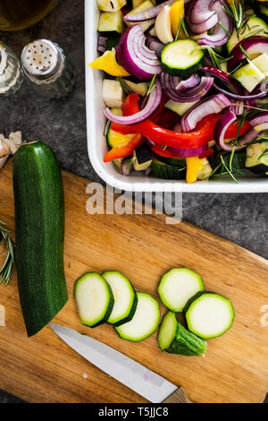 Mix of raw vegetables in casserole Stock Photo
