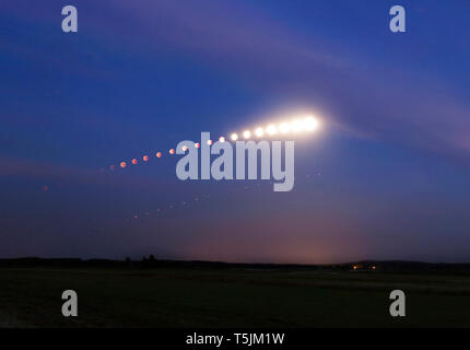 Germany, composite sequence of total lunar eclipse with Mars Stock Photo
