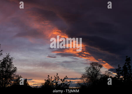 Dramatic beautiful colored cloudy sky at sunset Stock Photo