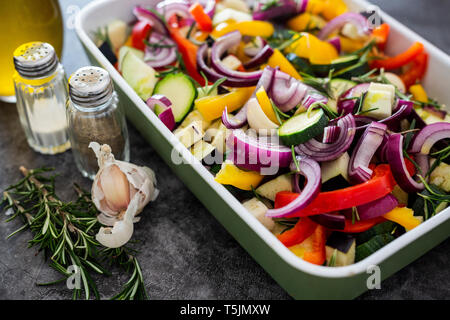 Mix of raw vegetables in casserole Stock Photo