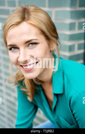 Portrait of a cheerful young woman Stock Photo
