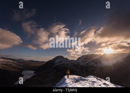 Mountaineer on mountain above Ogwen Valley Stock Photo