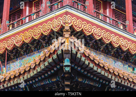 Roof details in Yonghe Temple also called Lama Temple of the Gelug school of Tibetan Buddhism in Dongcheng District, Beijing, China Stock Photo