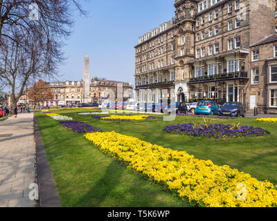 The Cenotaph and spring flowers in front of the Yorkshire Hotel in Prospect Gardens Harrogate Yorkshire England Stock Photo