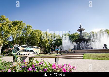 Mendoza, Argentina - April 13th 2019: Kids playing near historical fountain in San Martin National park Stock Photo