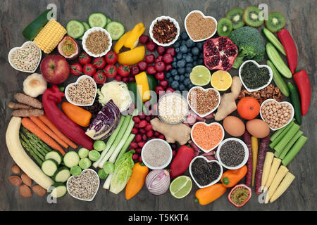 Selection of fresh vegetables and cooked cereal, grains and legume ...