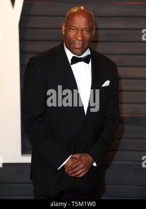 ***FILE PHOTO*** JOHN SINGLETON IN COMA AFTER STROKE BEVERLY HILLS - FEBRUARY 28: John Singleton arrives at the Vanity Fair Oscar Party 2016 at the Wallis Annenberg Center for the Performing Arts on February 28, 2016 in Beverly Hills, California. PWPG/MediaPunch Stock Photo