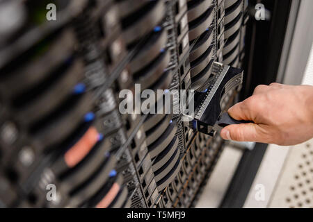 IT Professional Removing Server Drive In San Stock Photo