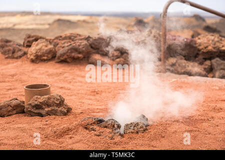 Steam coming from a hole in the ground, Lanzarote Stock Photo