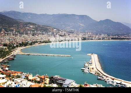 Alanya port, Famous tourist destination with high mountains. Part of ancient old Castle Stock Photo