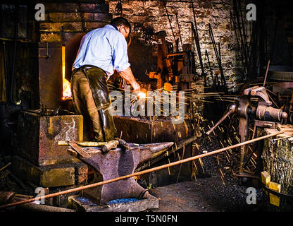 Black country industrial chain making huge large iron steel chain links ...