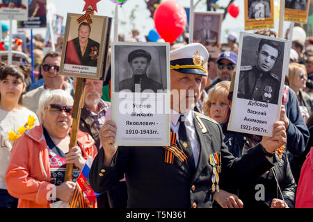 Russia, Nakhodka, 05/09/2017. Annual event Immortal Regiment on Victory Day (May 9). People hold portraits of relatives, soldiers of World War 2 and G Stock Photo