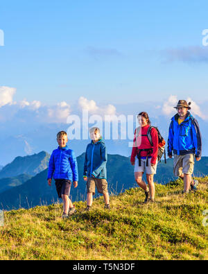 Active family hiking in high alpine region in austrian alps Stock Photo ...