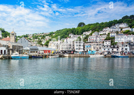 6 June 2018: Looe, Cornwall, UK - The small coastal town of Looe, with the River Looe and hillside houses. Stock Photo