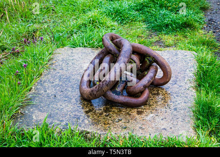 Upnor, Kent, UK. A chain concreted into a block at Medway Marina. Stock Photo