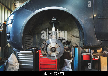car disc brake and shock absorber repair Stock Photo