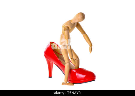 Wooden dummy in the shoe fitting - isolated Stock Photo