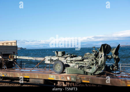 U.S. Army equipment assigned to the 86th Infantry Brigade Combat Team (Mountain), awaits transport after being loaded onto rail cars in Burlington, Vt., April 16, 2019. Soldiers from Vermont, Massachusetts and Connecticut loaded and over 600 vehicles onto 210 rail cars to be transported to Fort Polk, Louisiana in preparation for a Joint Readiness Training Center rotation next month. (U.S. Air National Guard photo by Master Sgt. Sarah Mattison) Stock Photo