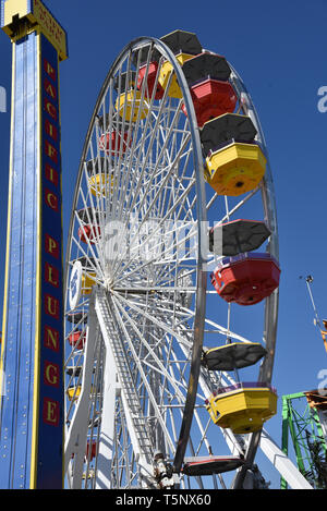 LOS ANGELES, CA/USA  - APRIL 11, 2019: Ferris Wheel at Pacific Park on the famous Santa Monica Pier Stock Photo