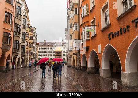 Innsbruck, Austria - October 27 2018: Famous street called Herzog-Friedrich-Straße on a rainy day Stock Photo