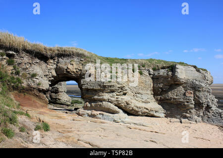 Sandstone Arch at Middle Eye, Hilbre Islands, Dee Estuary Stock Photo