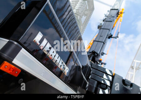 MUNICH / GERMANY - APRIL 14, 2019: Liebherr logo on a black crane at a Liebherr machine dealer. Stock Photo