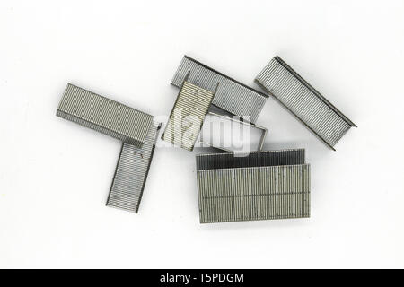 Metal staples for stapler isolated on white background Stock Photo