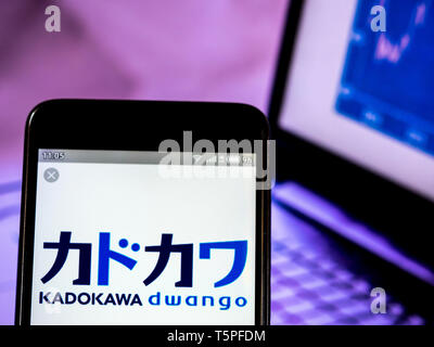 In this photo illustration a Kadokawa Dwango Corporation  logo seen displayed on a smart phone Stock Photo