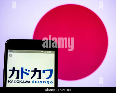 In this photo illustration a Kadokawa Dwango Corporation  logo seen displayed on a smart phone Stock Photo