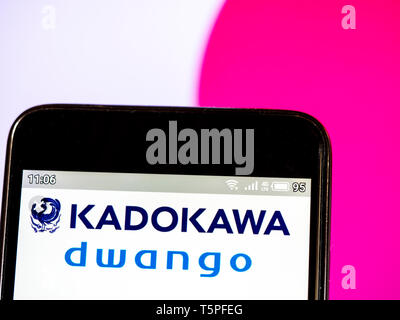 In this photo illustration a Kadokawa Dwango Corporation  logo seen displayed on a smart phone Stock Photo