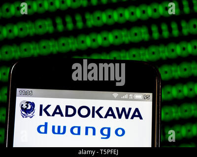 In this photo illustration a Kadokawa Dwango Corporation  logo seen displayed on a smart phone Stock Photo